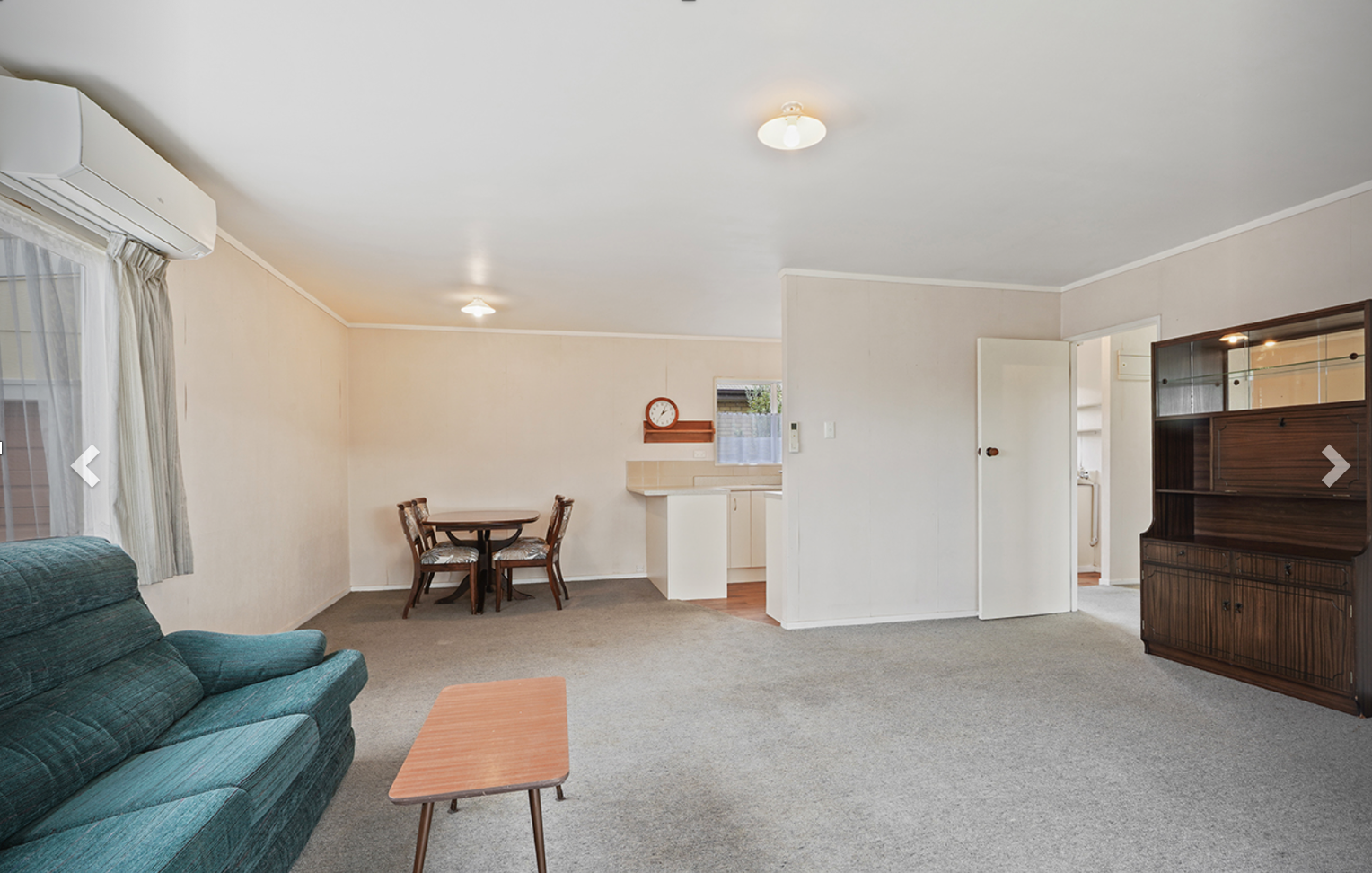 Before — old lounge green sofa