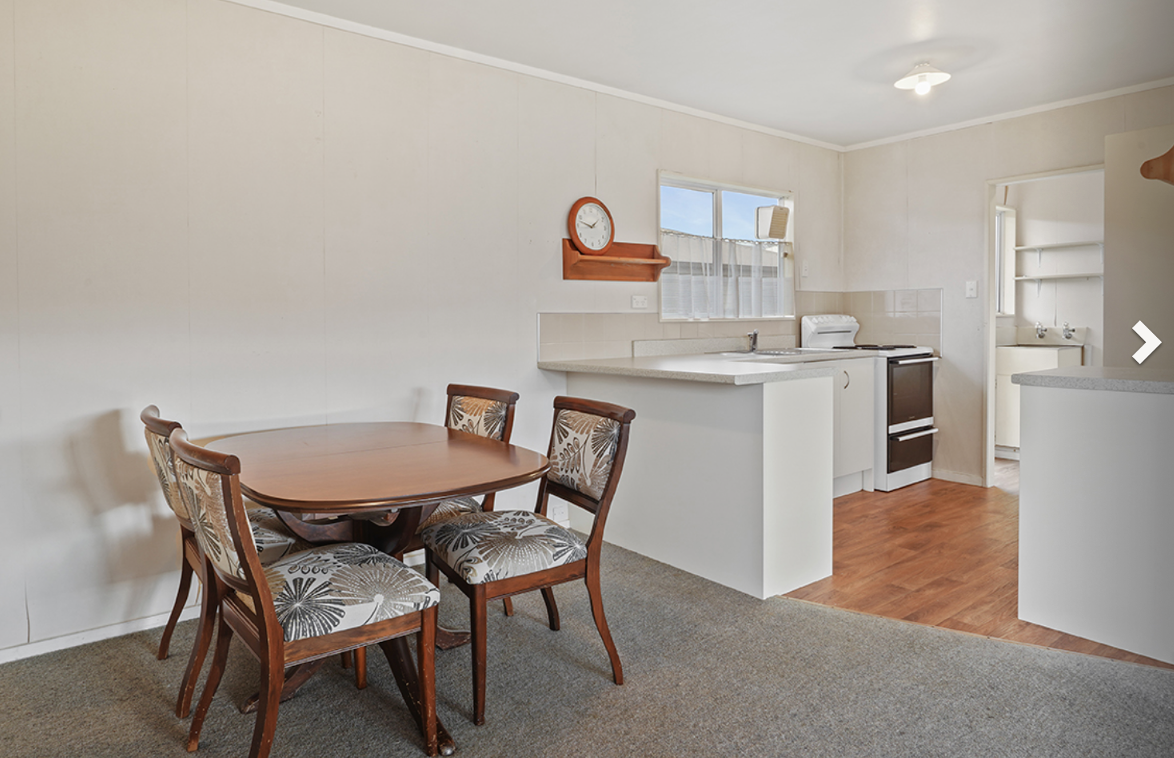 Before — bare floors mid renovation